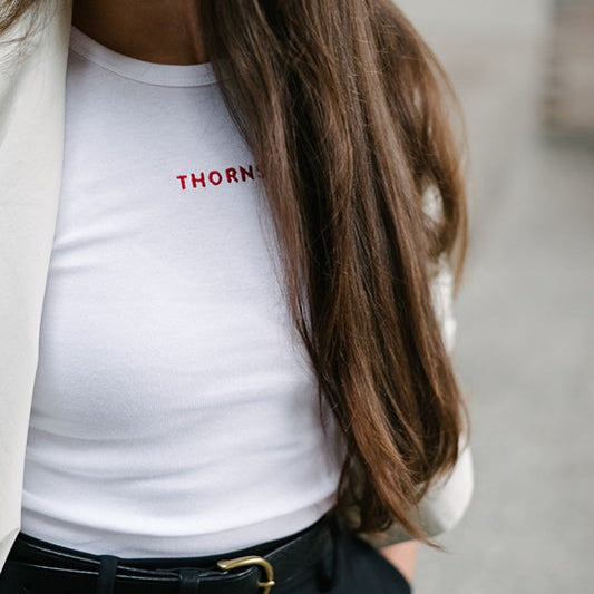 Thorns Mini Logo Women's White Baby Tee